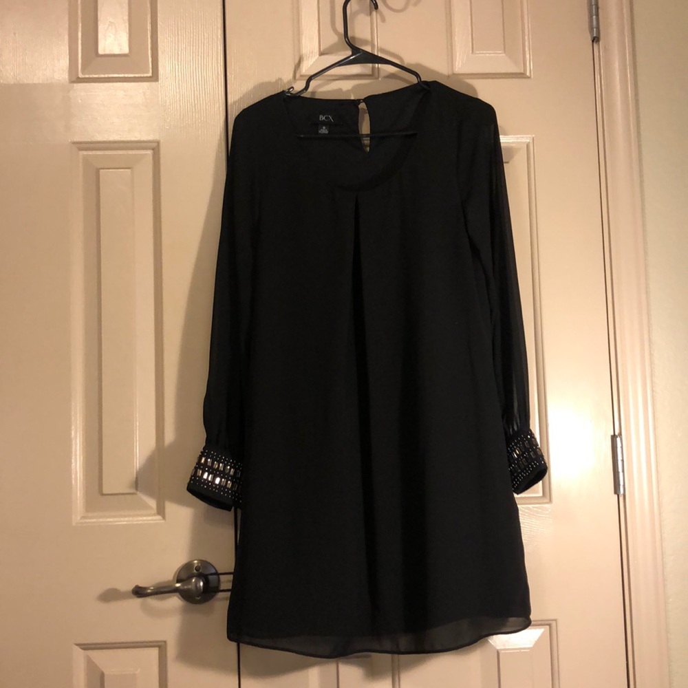 Little black shift dress with beaded cuffs